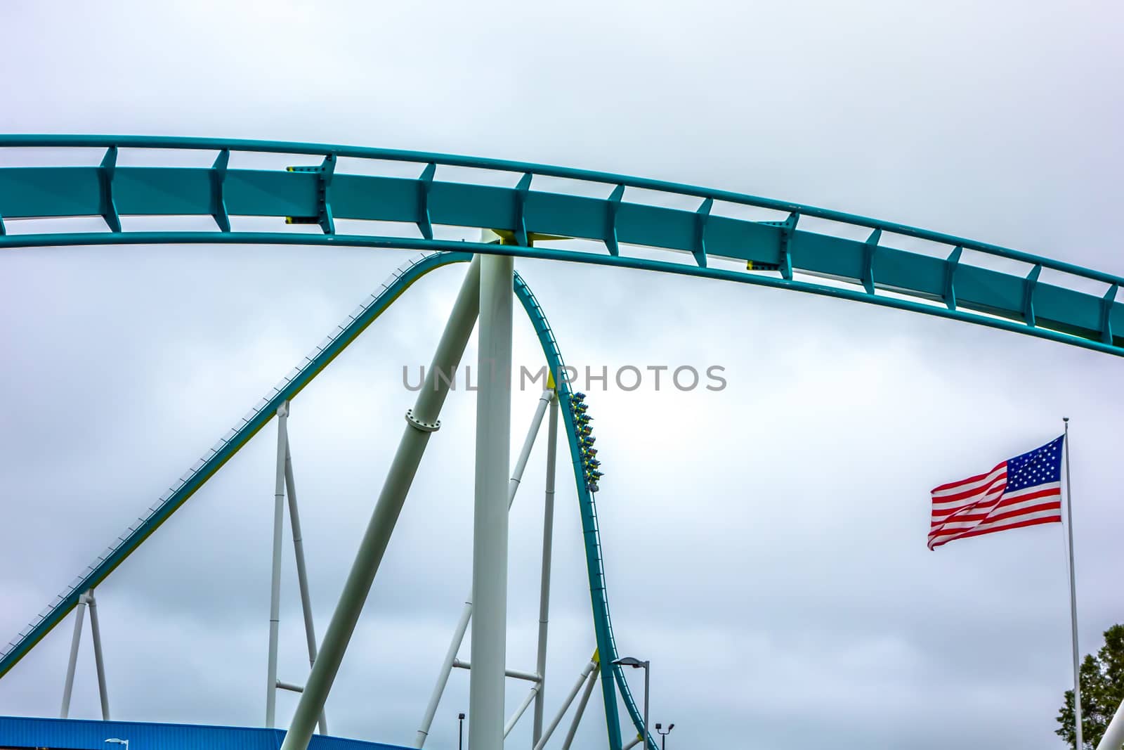 crazy rollercoaster rides at amusement park by digidreamgrafix