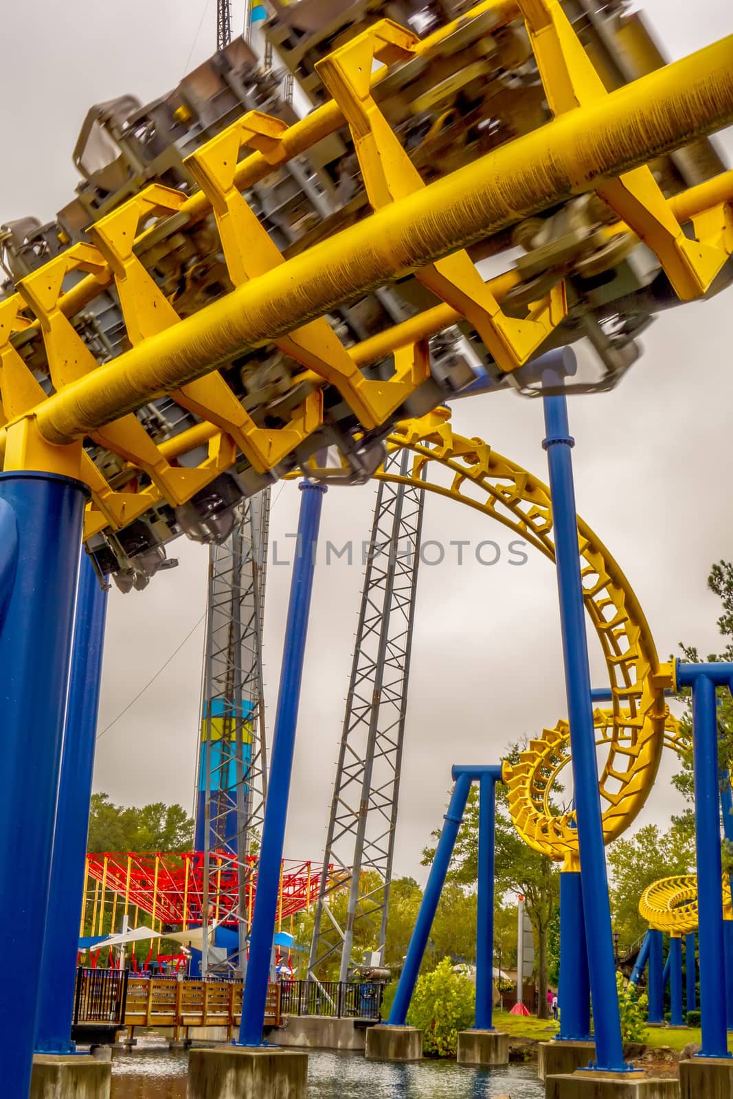 crazy rollercoaster rides at amusement park by digidreamgrafix