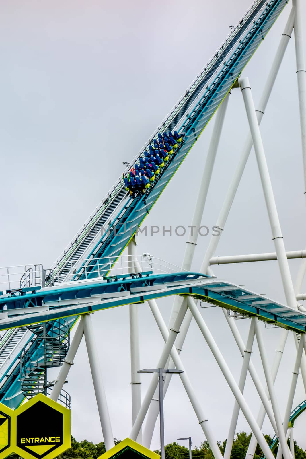 crazy rollercoaster rides at amusement park by digidreamgrafix