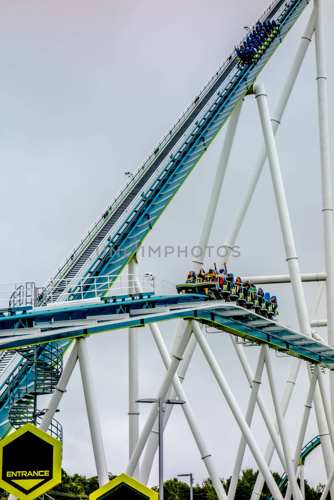 crazy rollercoaster rides at amusement park by digidreamgrafix