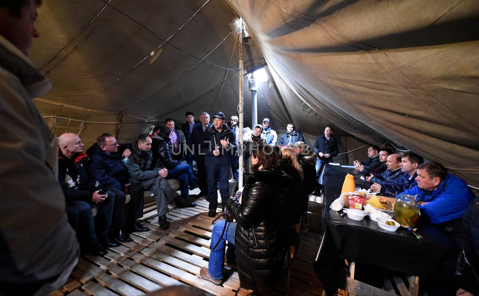 UKRAINE, Kiev: Radical Party leader Oleg Lyashko speaks to protesters at an encampment outside the Cabinet of Ministers in Kiev, Ukraine on October 27, 2015, in a continuation of the Tariff Maidan protests. The movement calls on the government to establish fair utility tariffs for Ukraine, considered too high by protesters; along with the resignation of the president, prime minister, and cabinet of ministers.