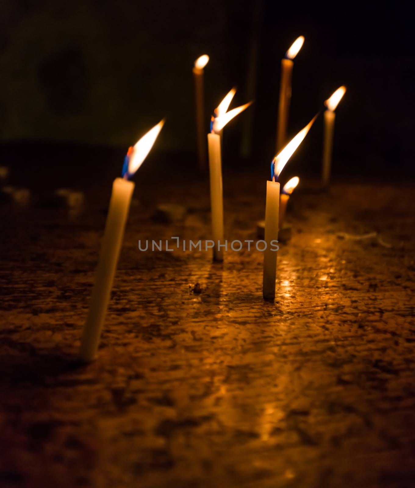 the dying candles in the church of the Holy Sepulchre in Jerusalem