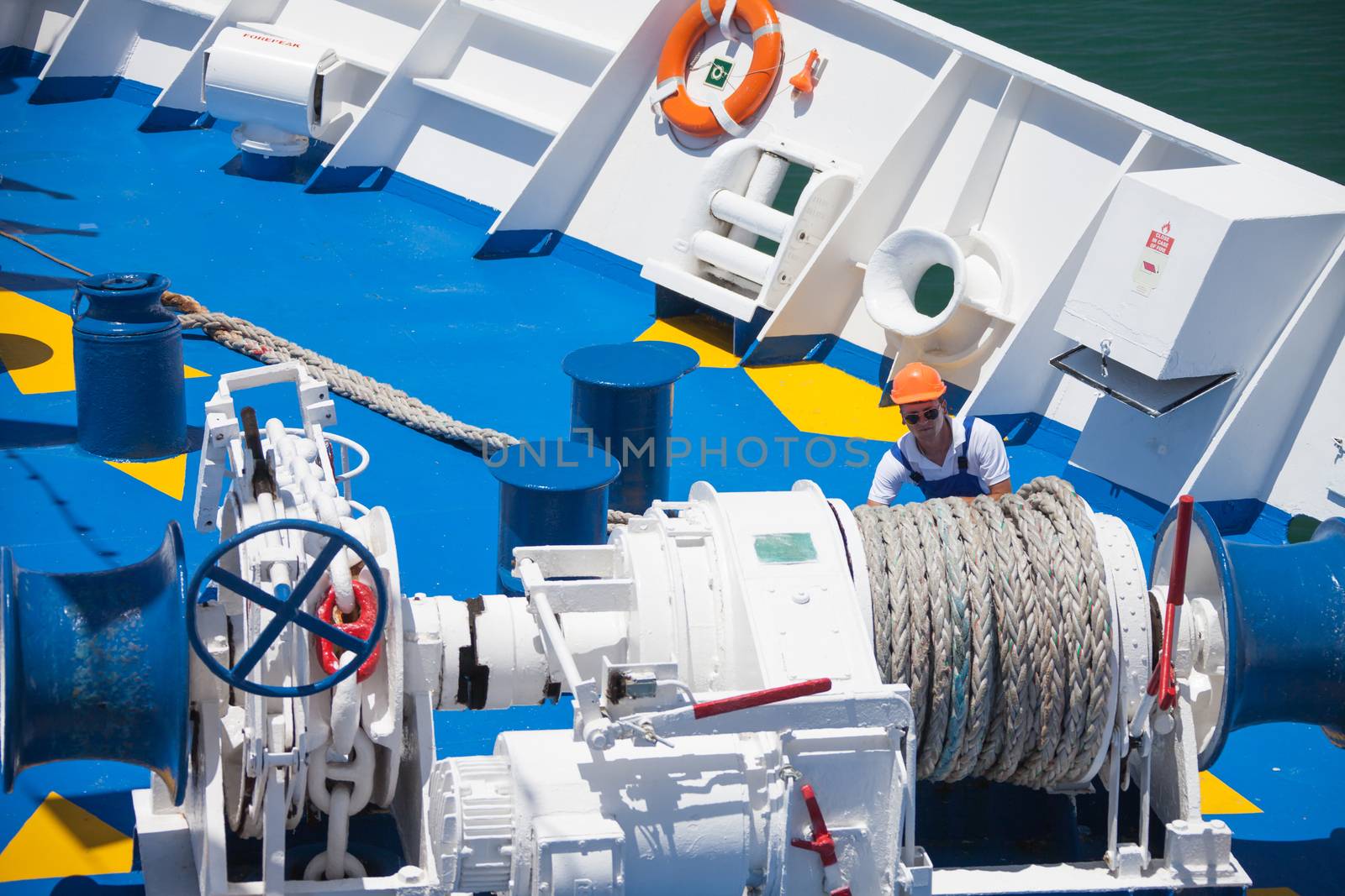 working at the stern, the liner day in summer