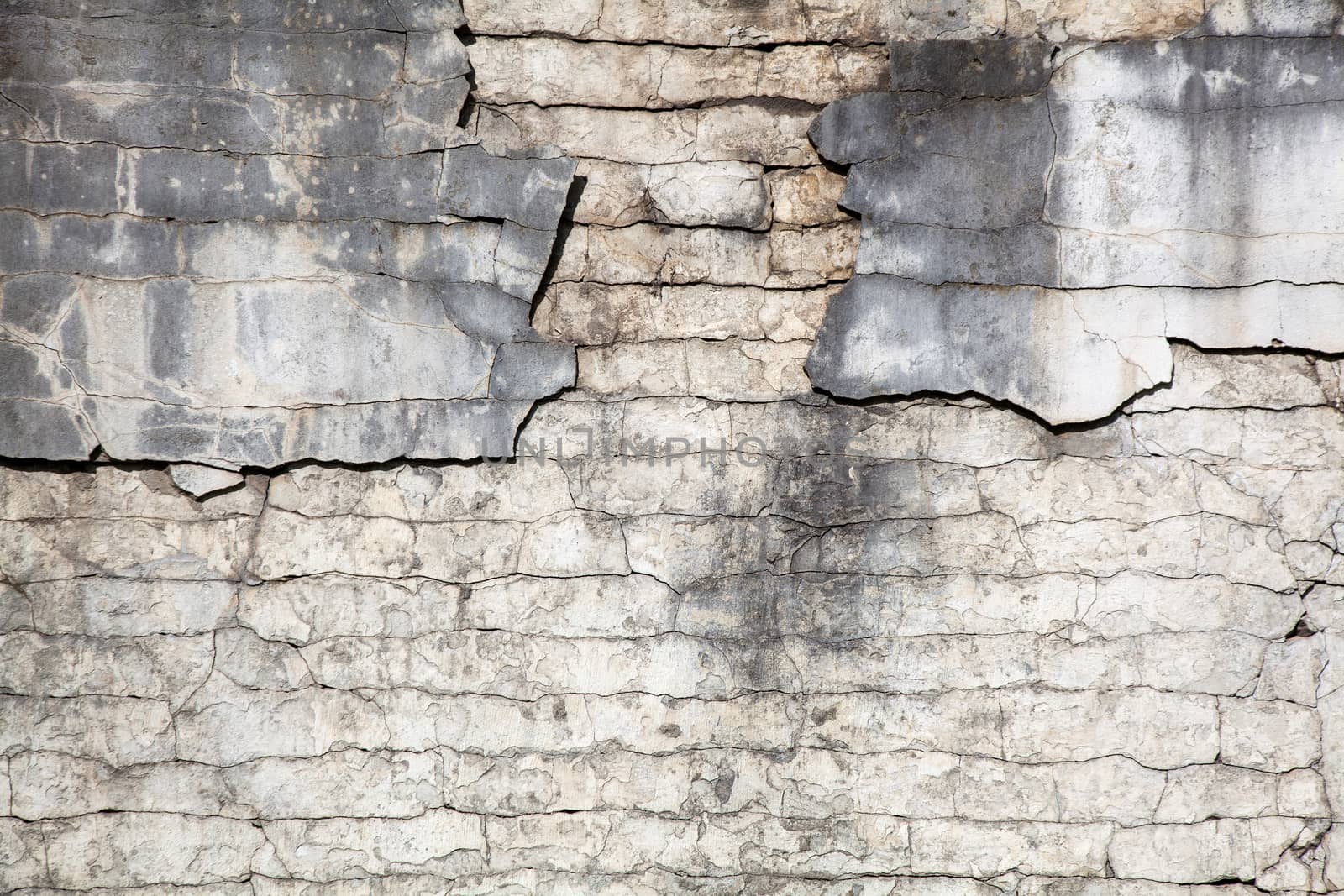 crumbling plaster texture with bricks