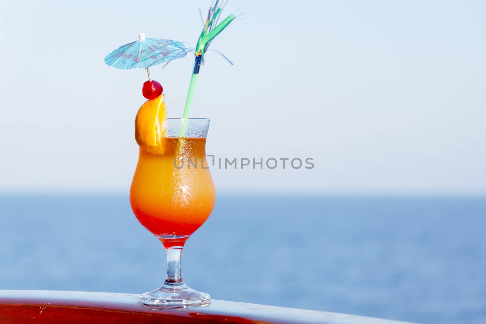 Enjoy a cocktail in the journey on a ship at sea