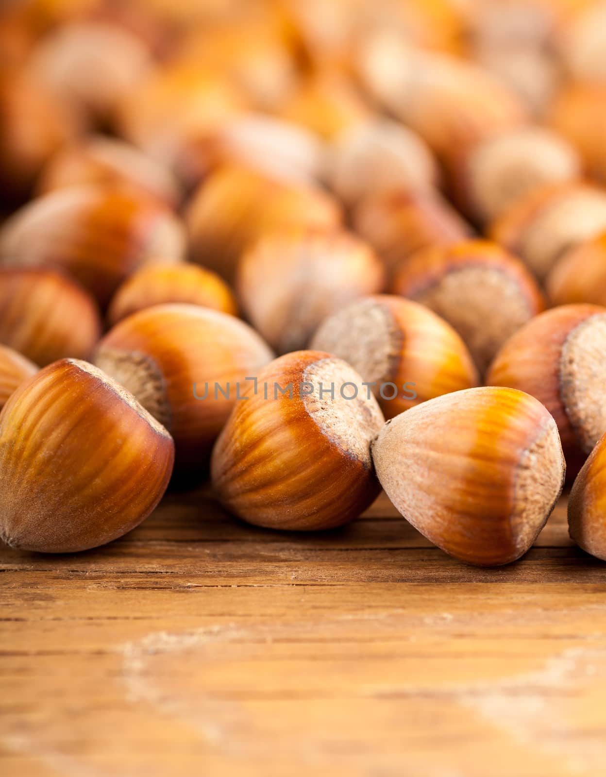 Dried whole tree nuts close-up on wooden background