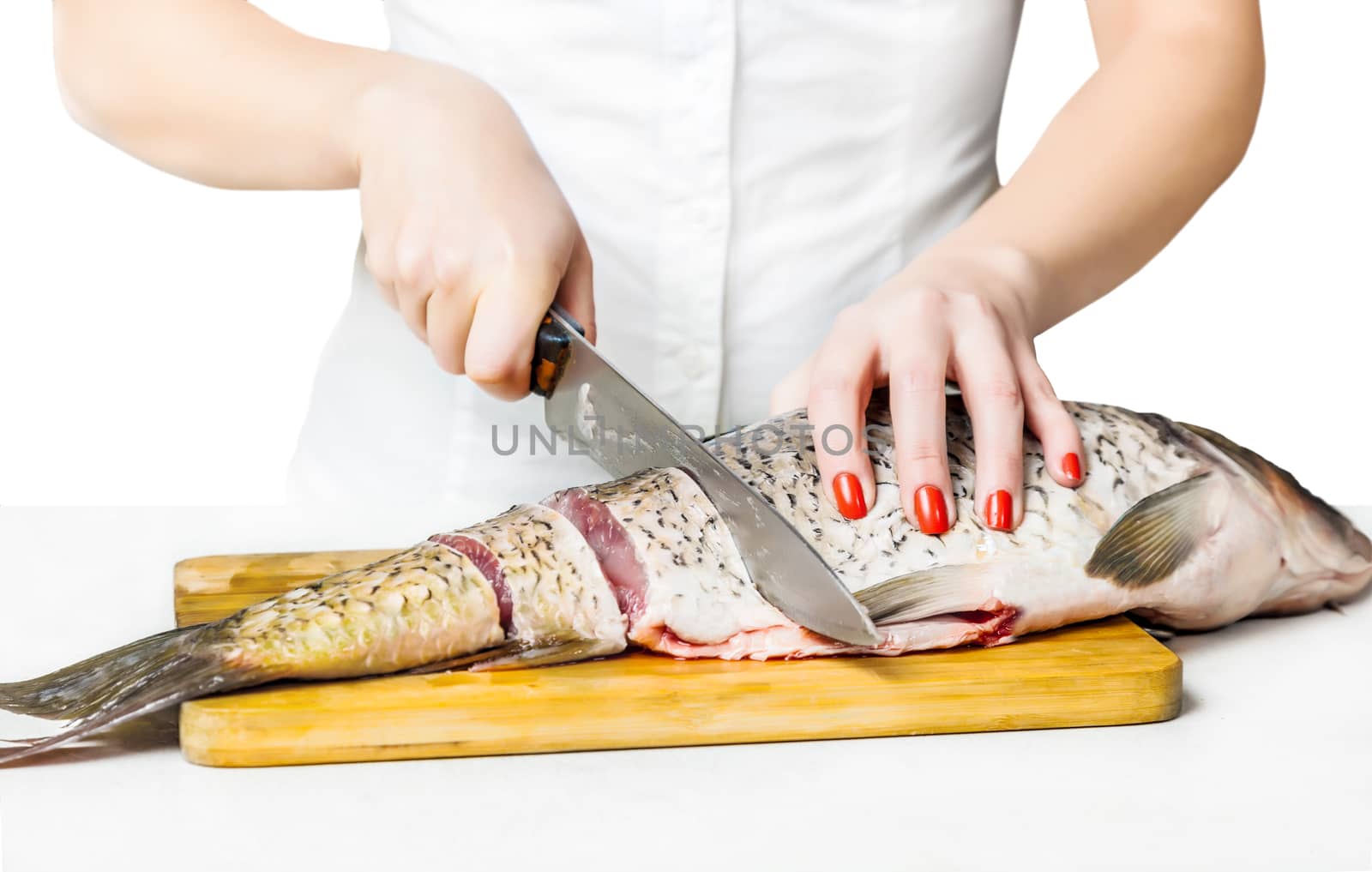 woman cook cut fish on the white isolated background