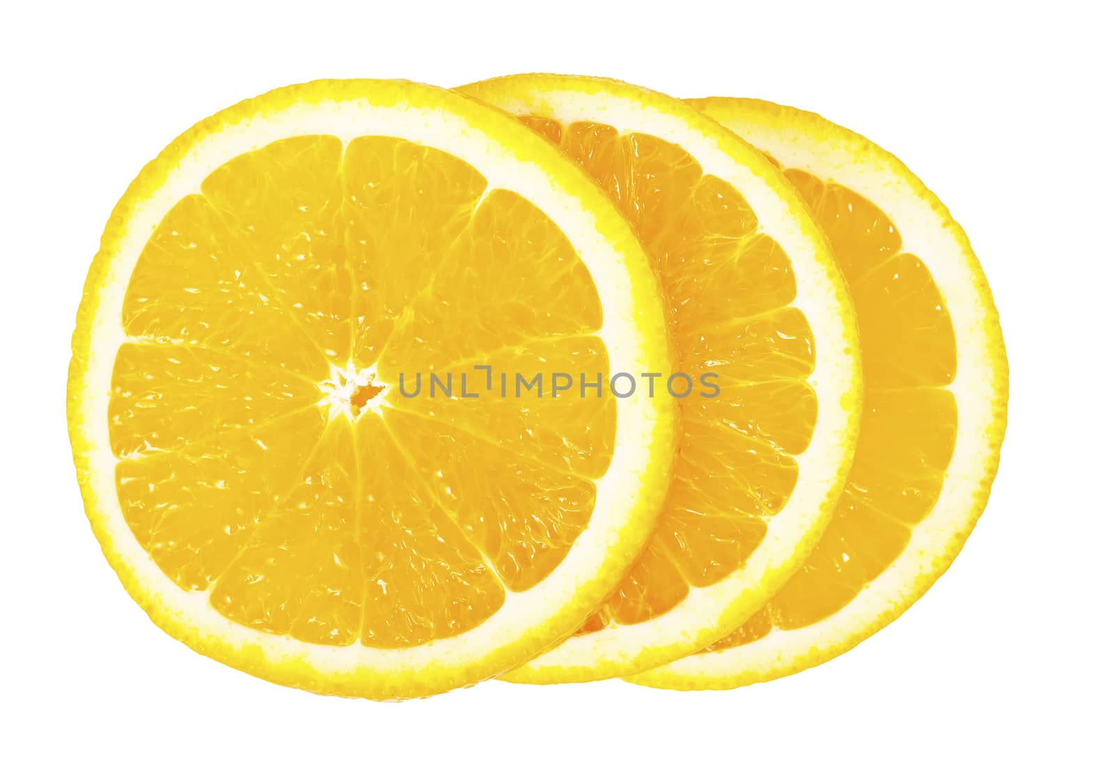 Three orange slices stacked on each other on a white isolated background