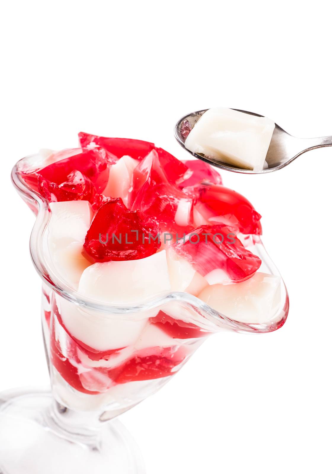 vanilla and red jelly in a glass goblet  by MegaArt