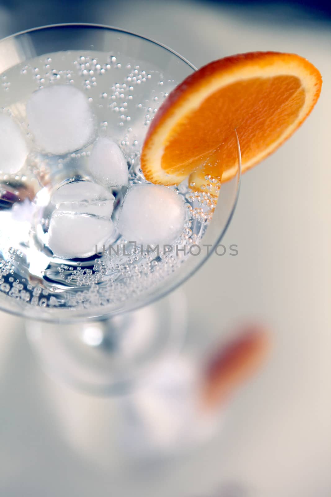 cocktail decorated with an orange slice