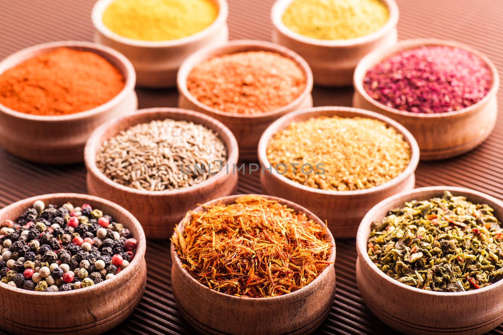 set spices in a wooden bowl close-up  by MegaArt