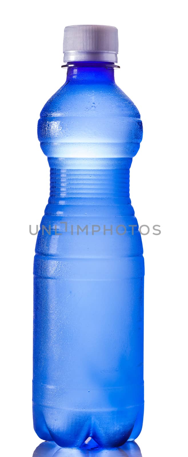 plastic bottle of water in the condensate on a white background isolated