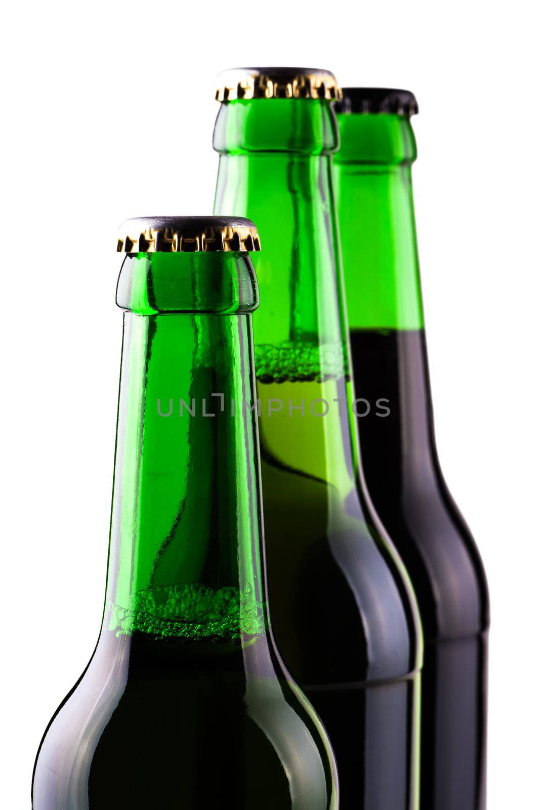 beer in glass bottles close-up isolated on white background