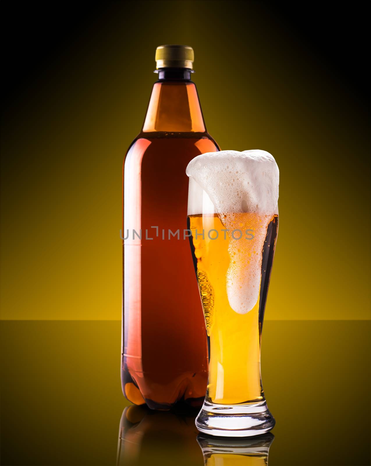 beer in glass and bottle on a dark background
