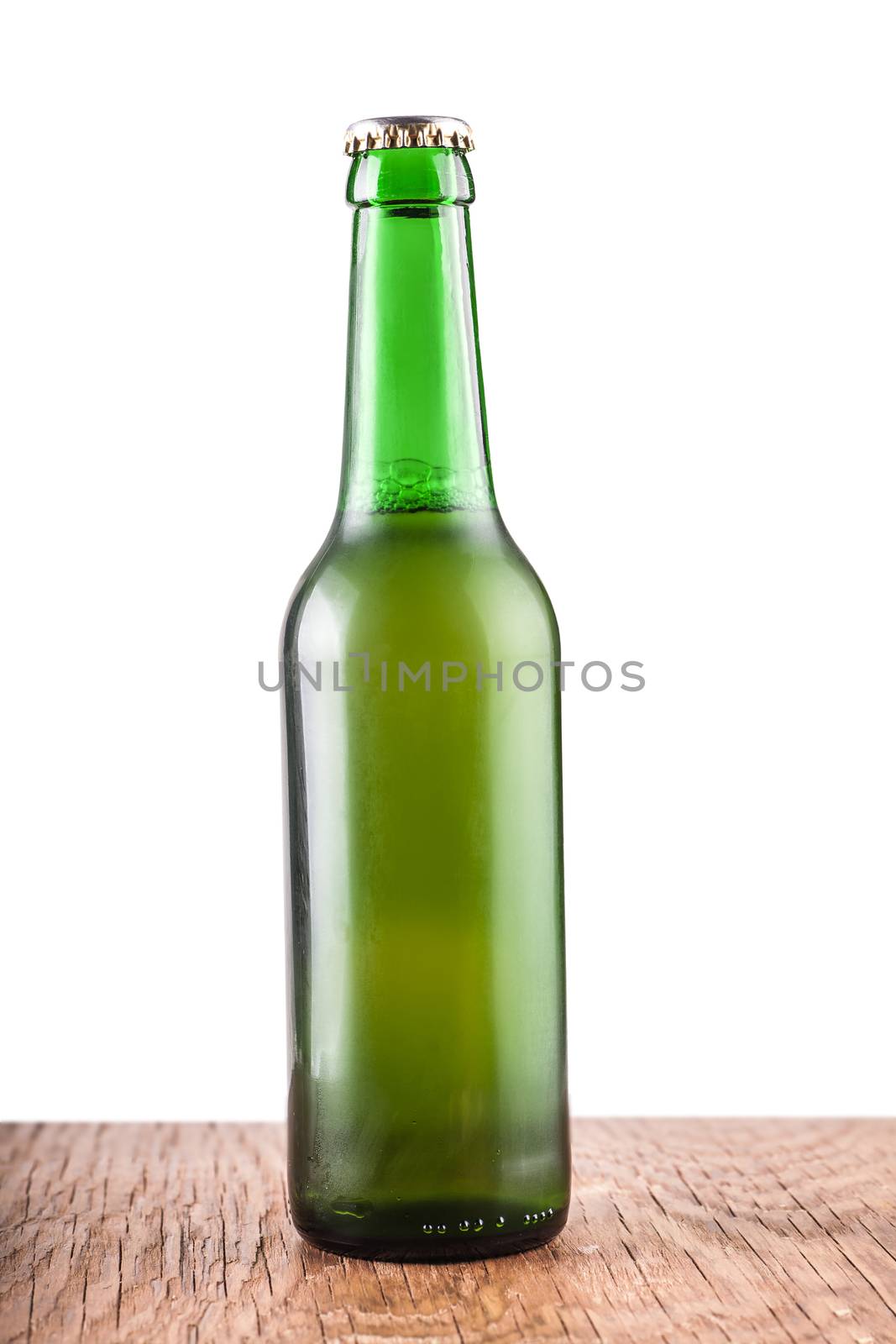 glass bottle of beer on a white background