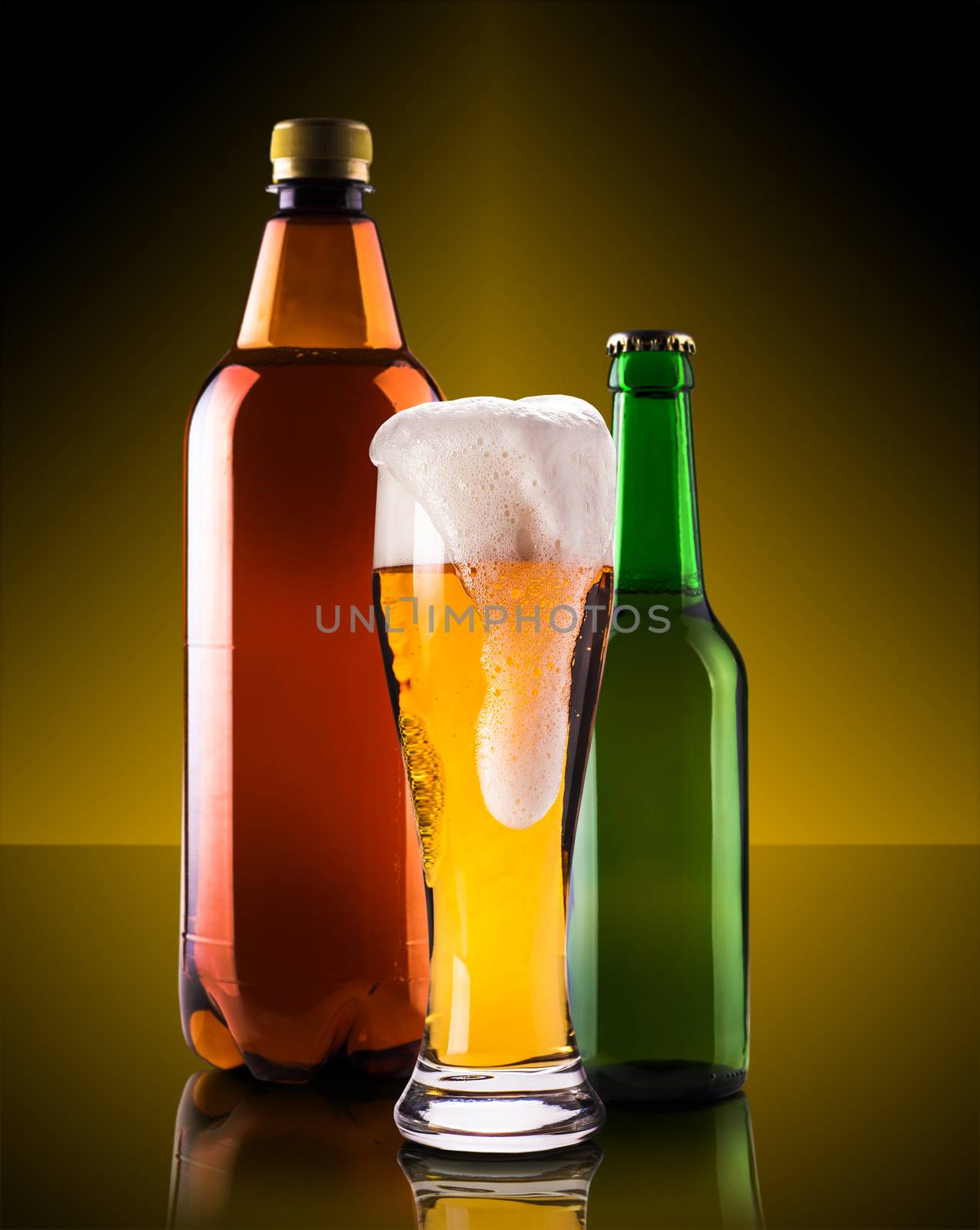 assortment beer bottles on a dark background