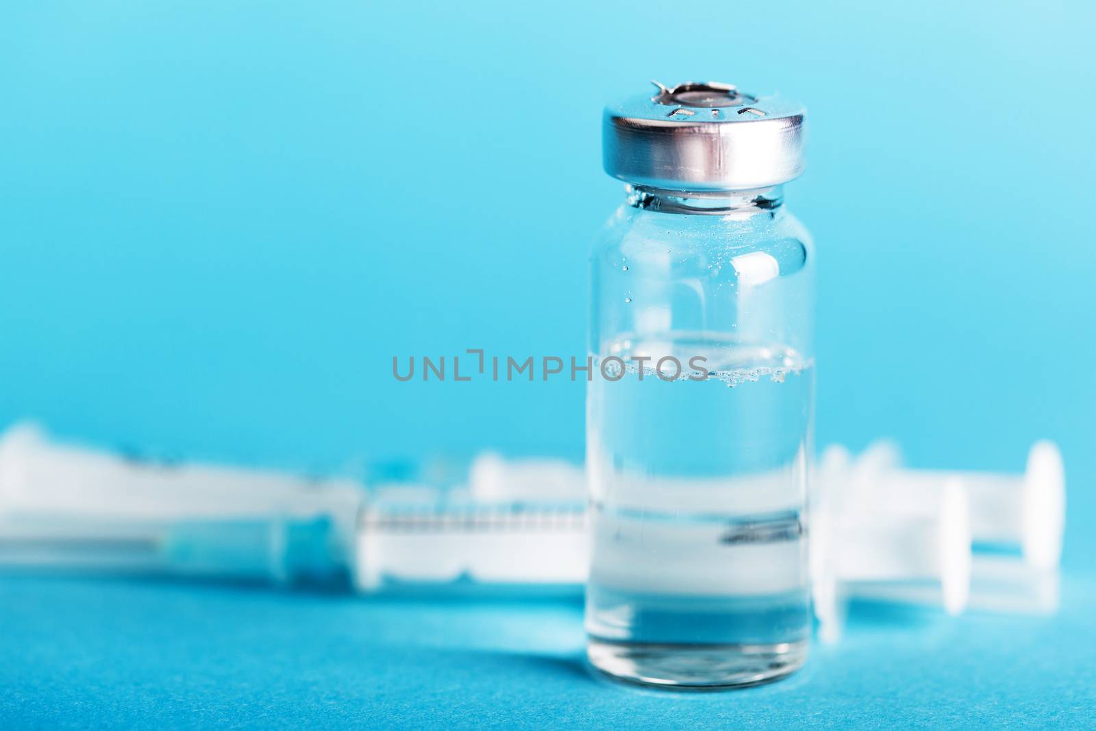 bottle of medicines close-up on a blue background