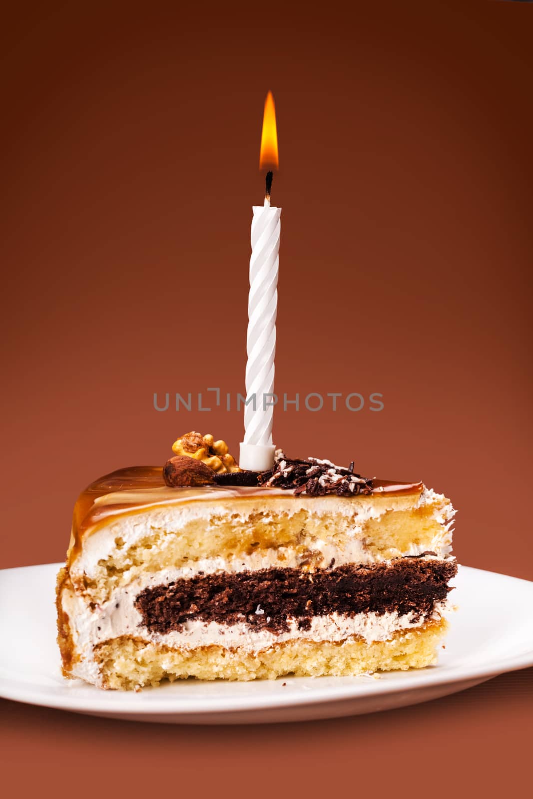 fresh piece of cake with a candle  by MegaArt