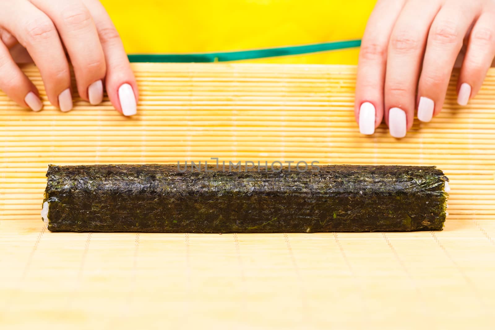 fresh roll in traditional japanese sushi mat