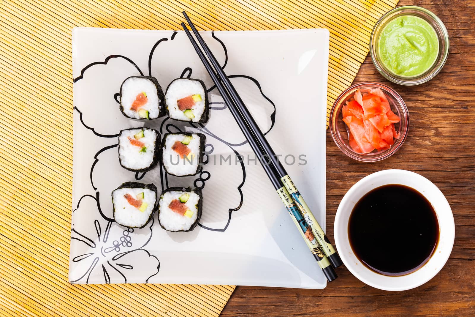 fresh sushi roll closeup on a wooden board