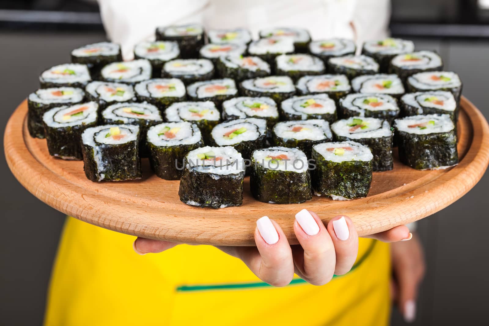 fresh sushi roll closeup on a wooden board