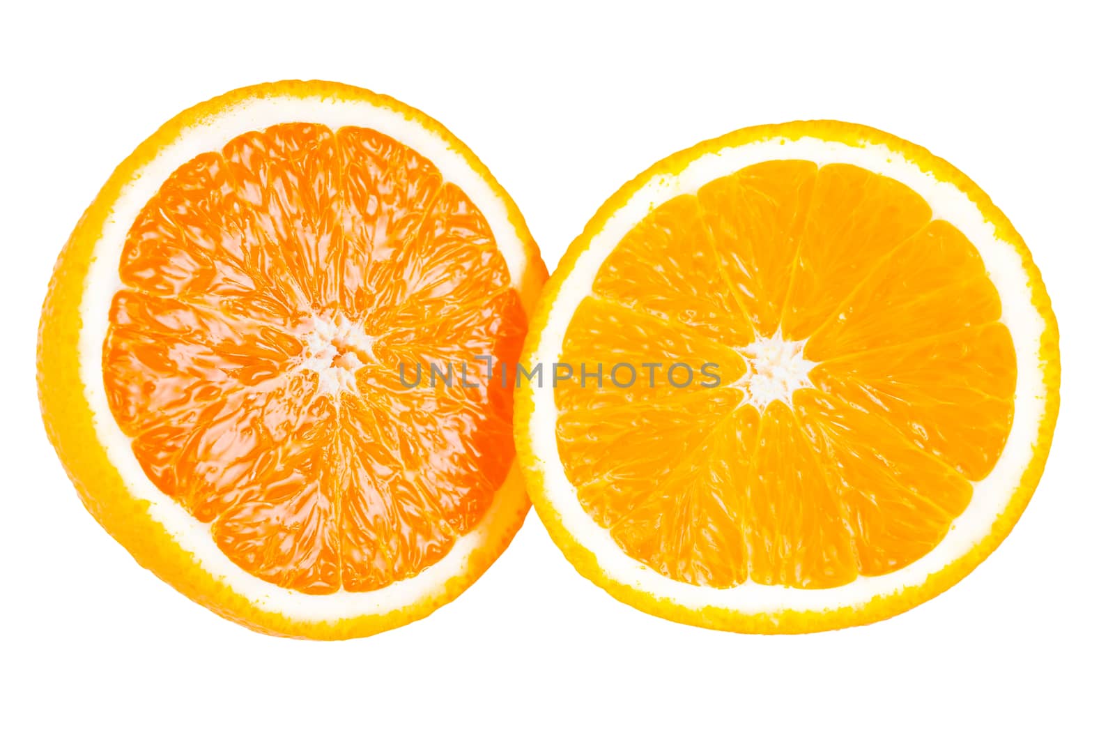 two pieces of orange beside to a white isolated background