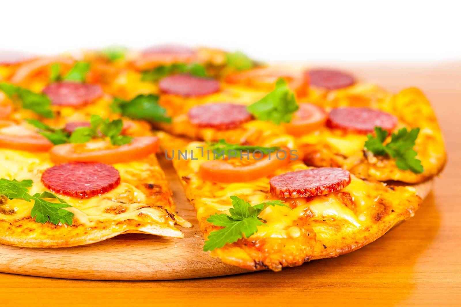 hot pizza with salami on white background