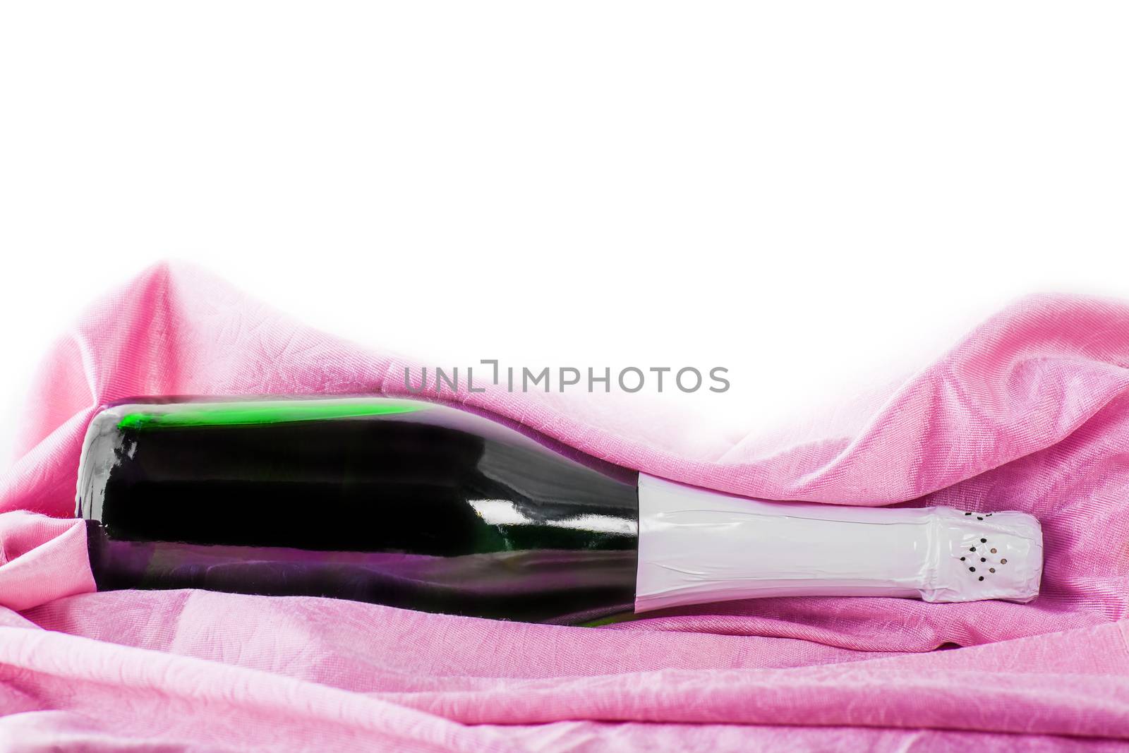  bottle of champagne wrapped in pink tissue