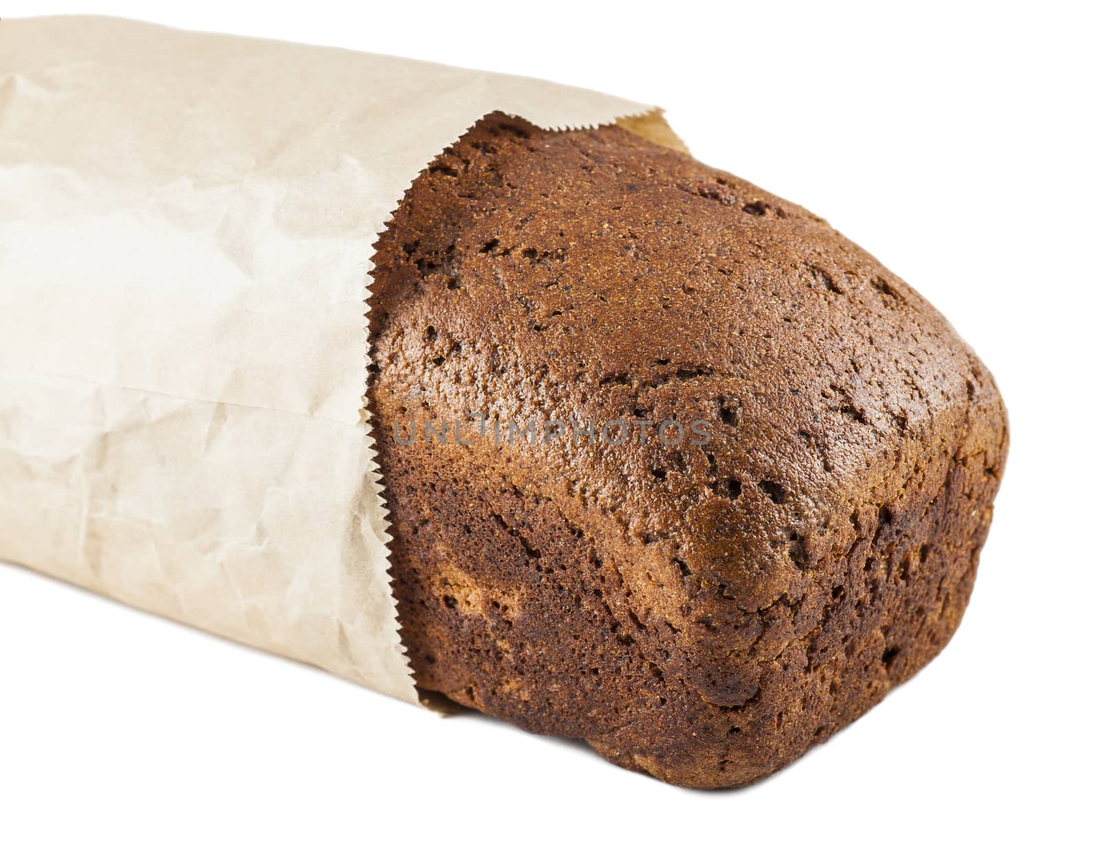 brown bread in paper packing isolated on a white background