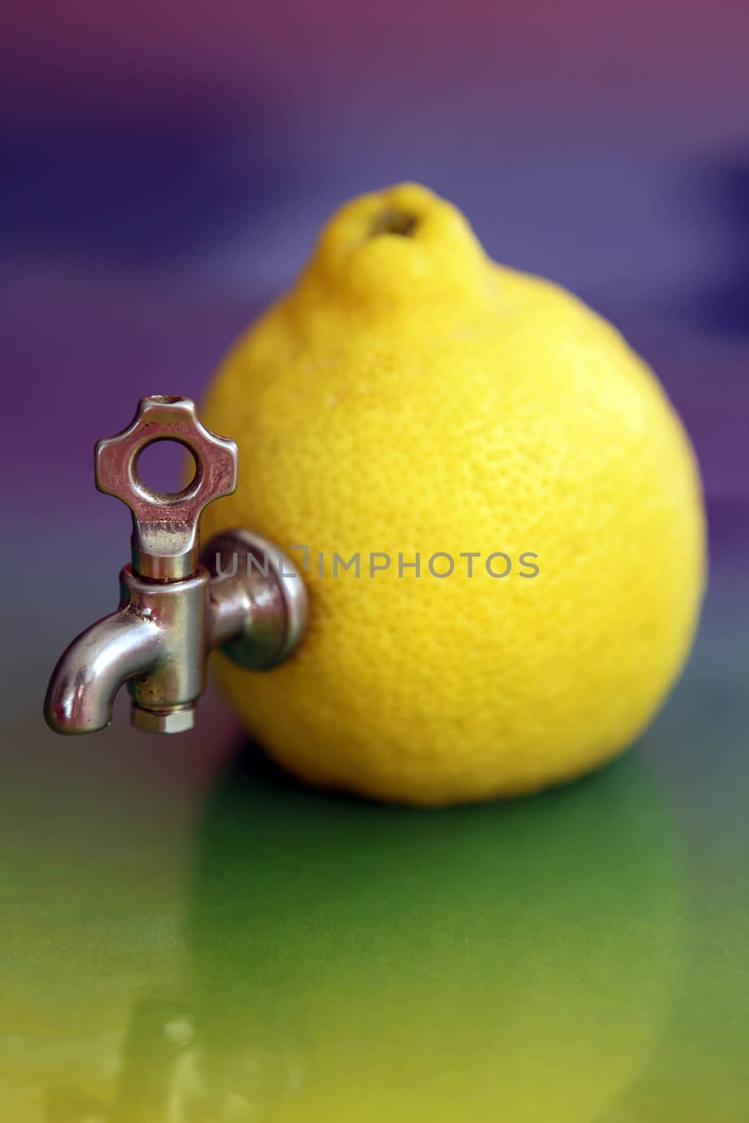 lemon with tap creative background