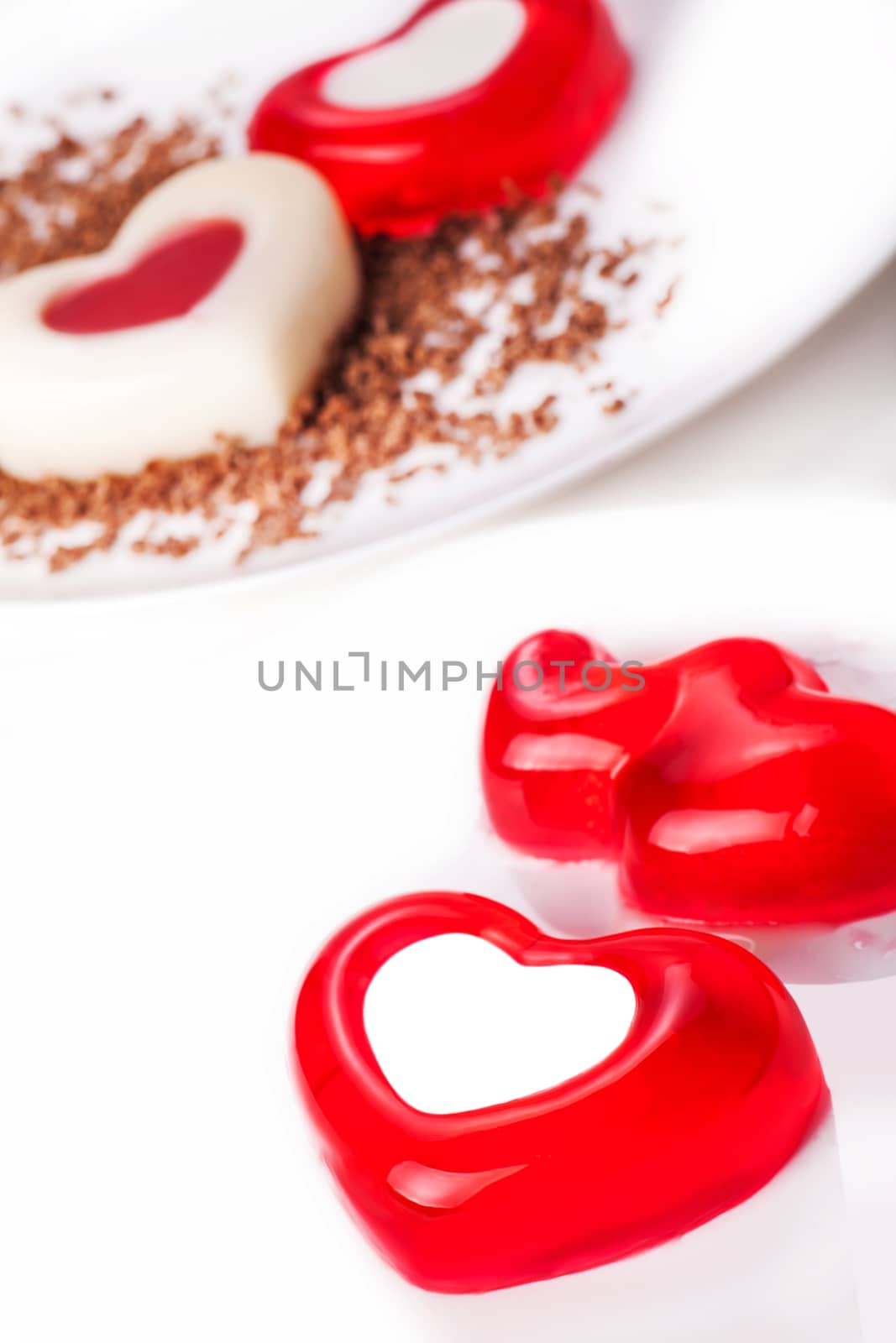 assorted jelly in the form of hearts on a light background