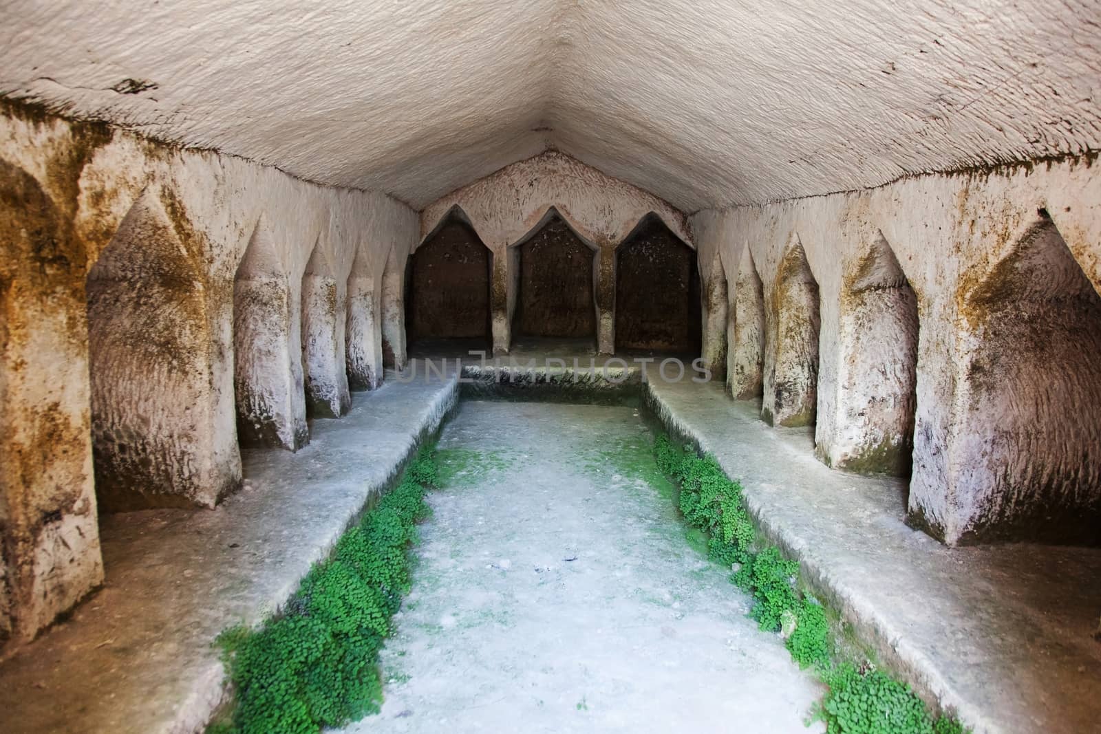 ancient stone burial ground with cabins for burials