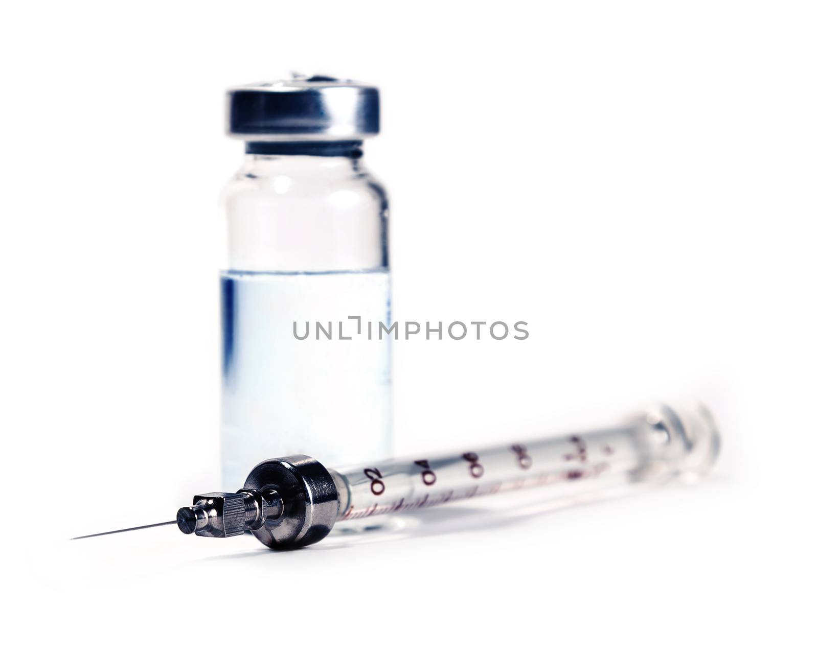 syringe with bottle closeup, medicine background