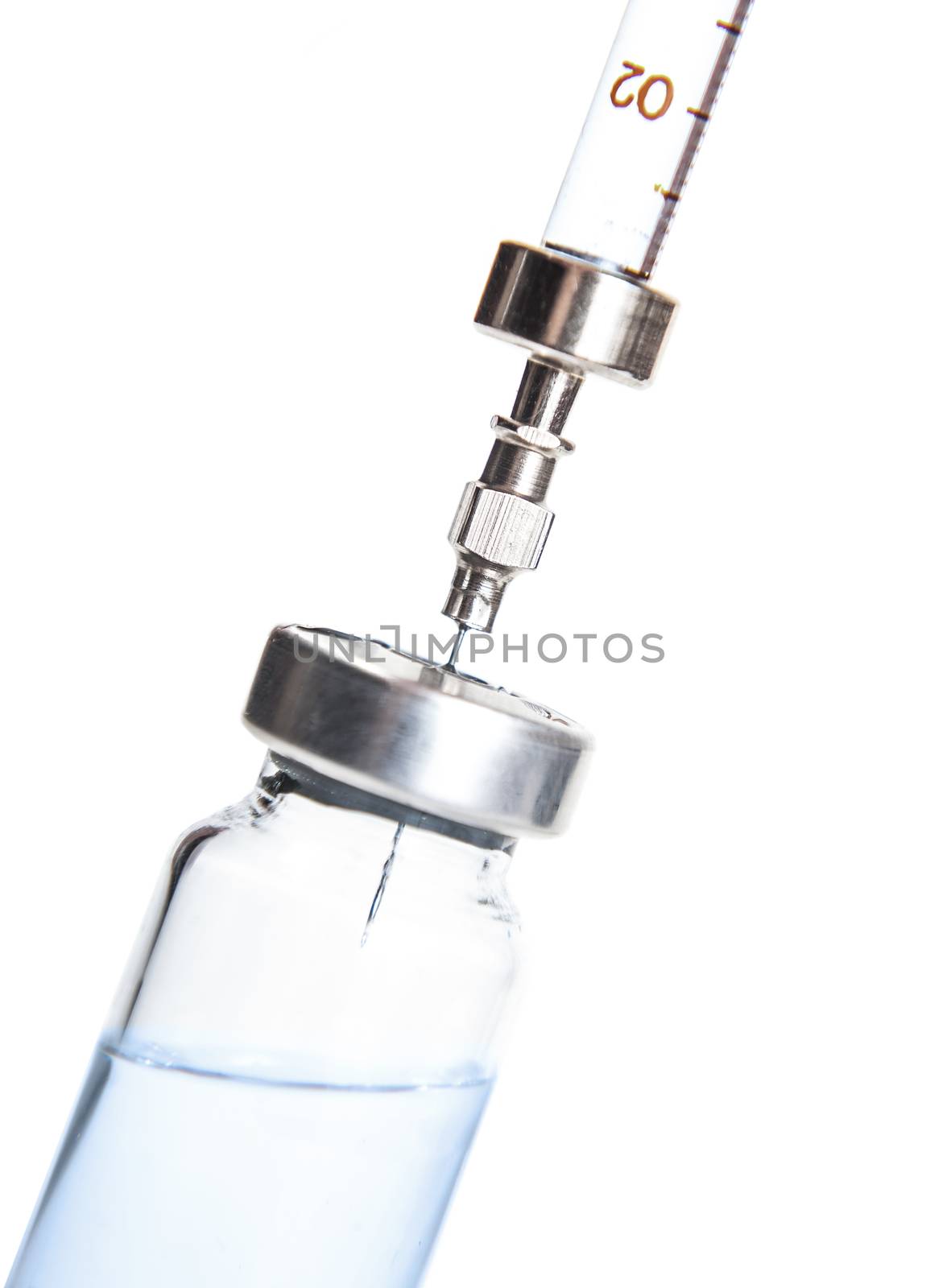 syringe with the vial preparation for injection on white background