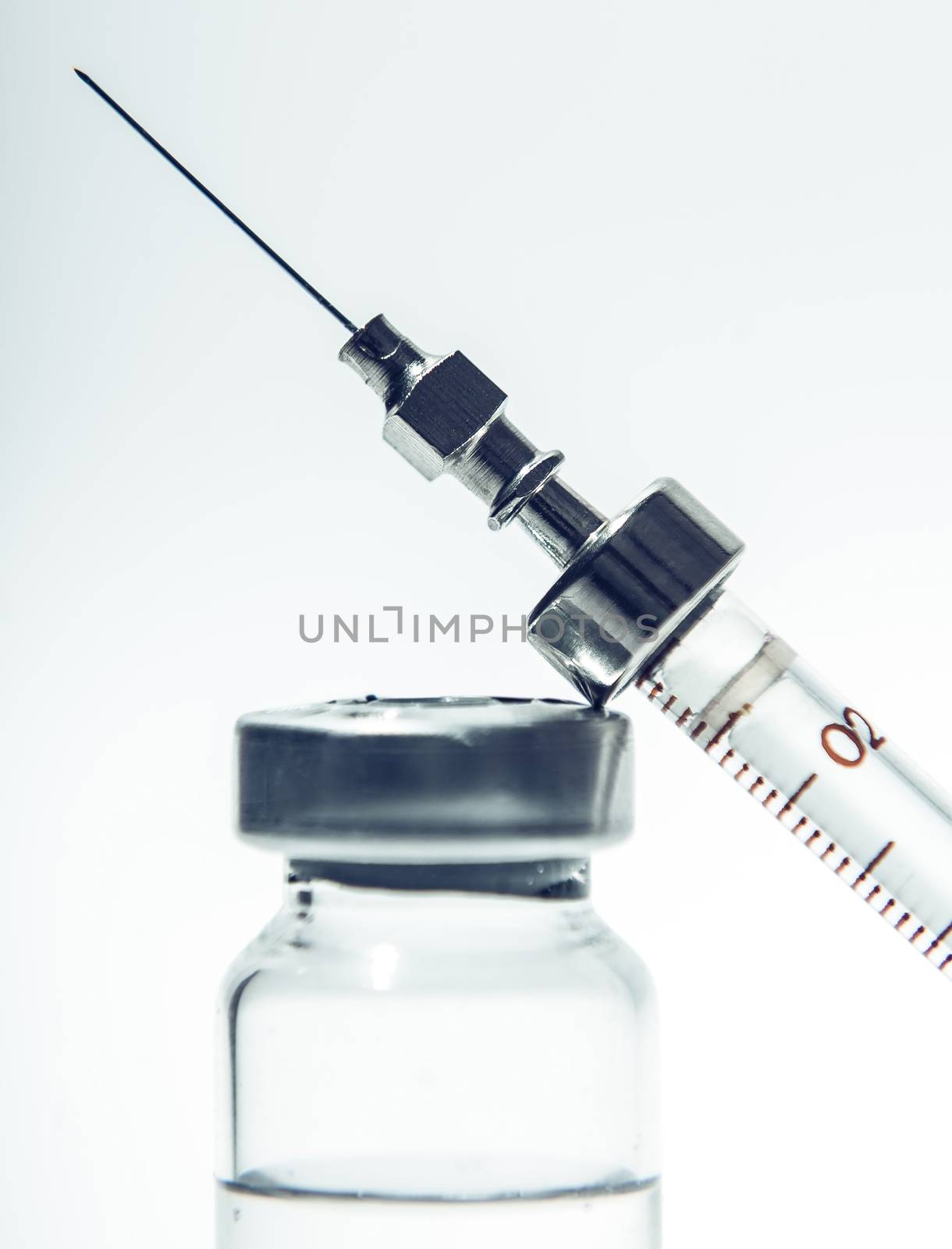 injection syringe closeup, medicine background