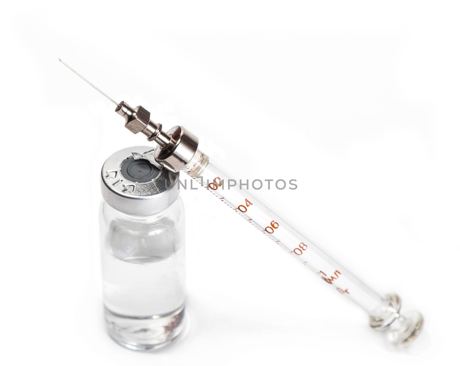 vial and syringe with medicine on an isolated white background
