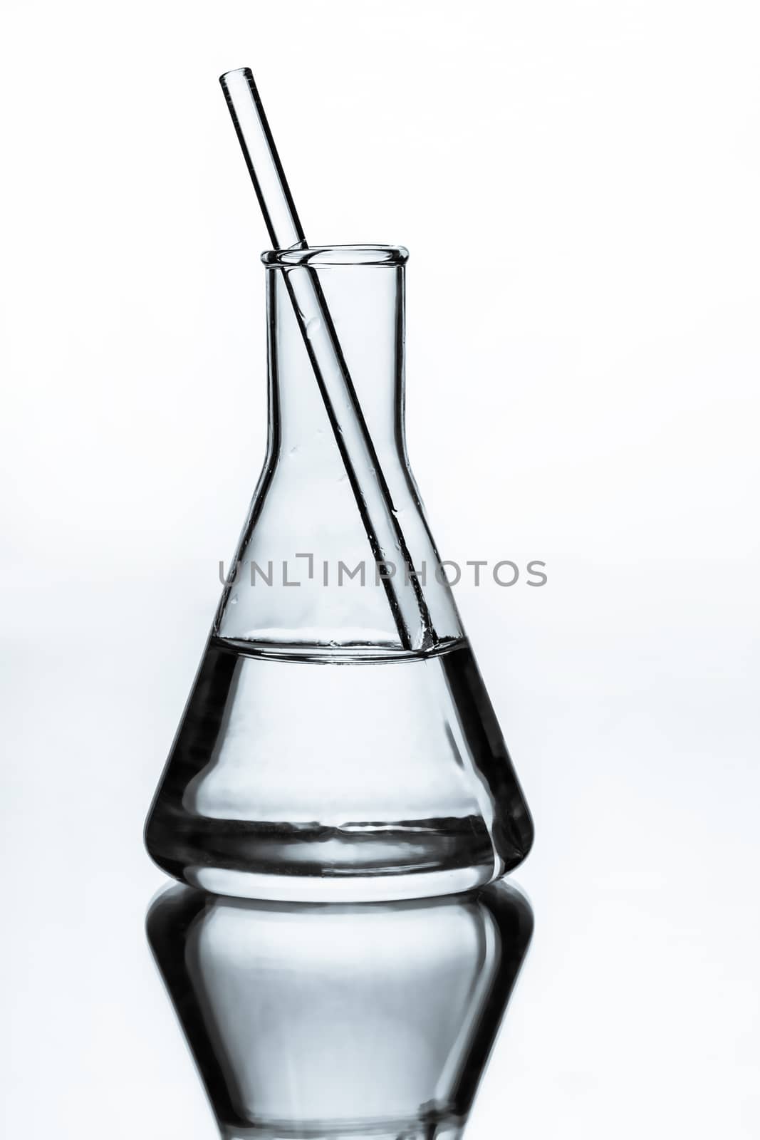chemical glass flask closeup on a light background
