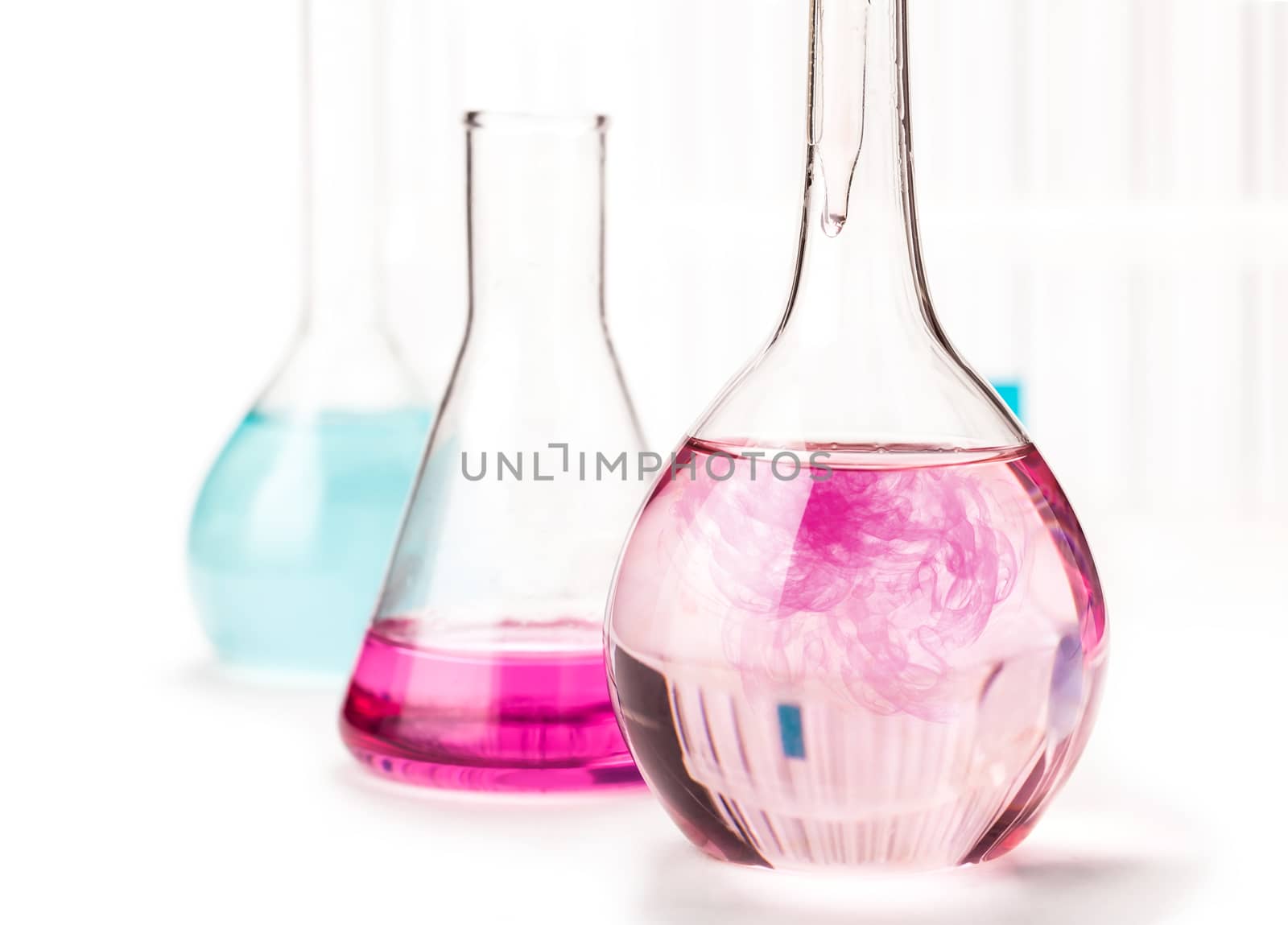 flask with reagent pink on a white background