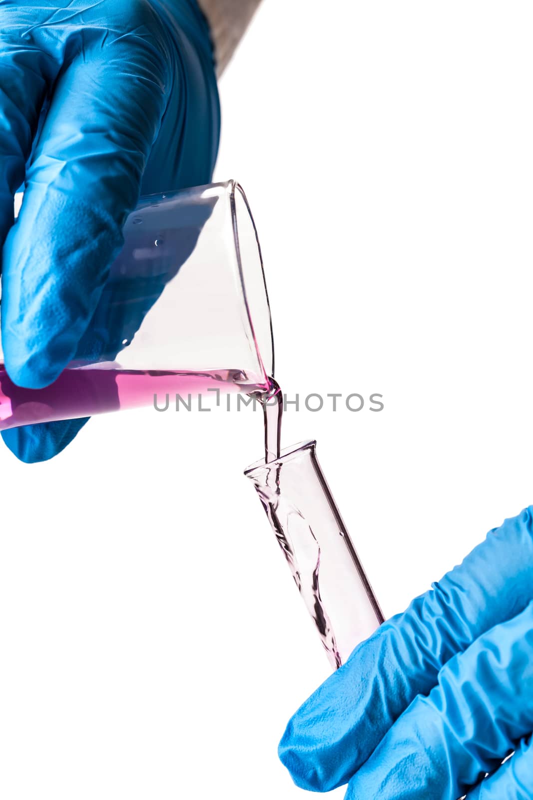 worker reagent pouring into the flask on a white background