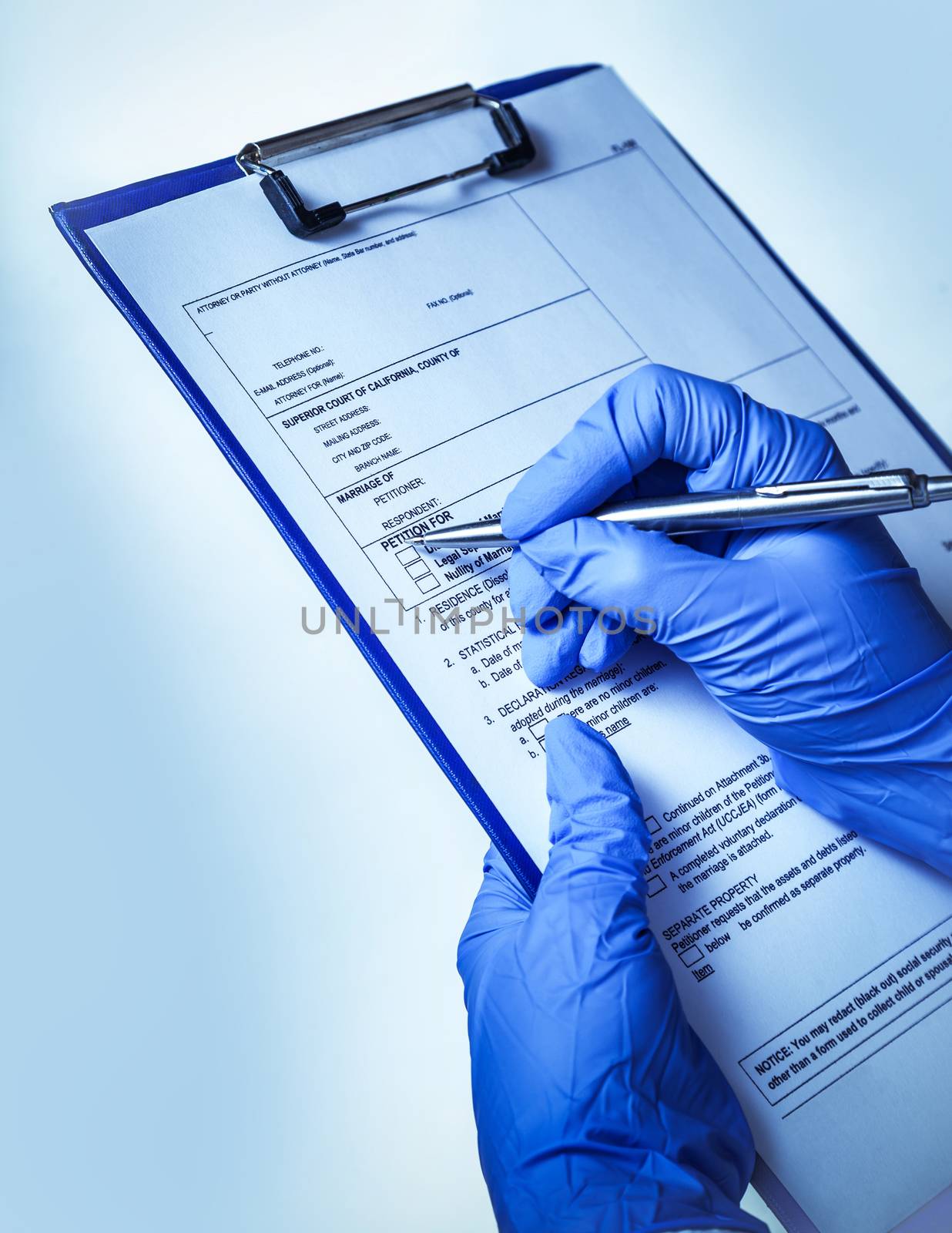 doctor fills patient's history, hospital  background