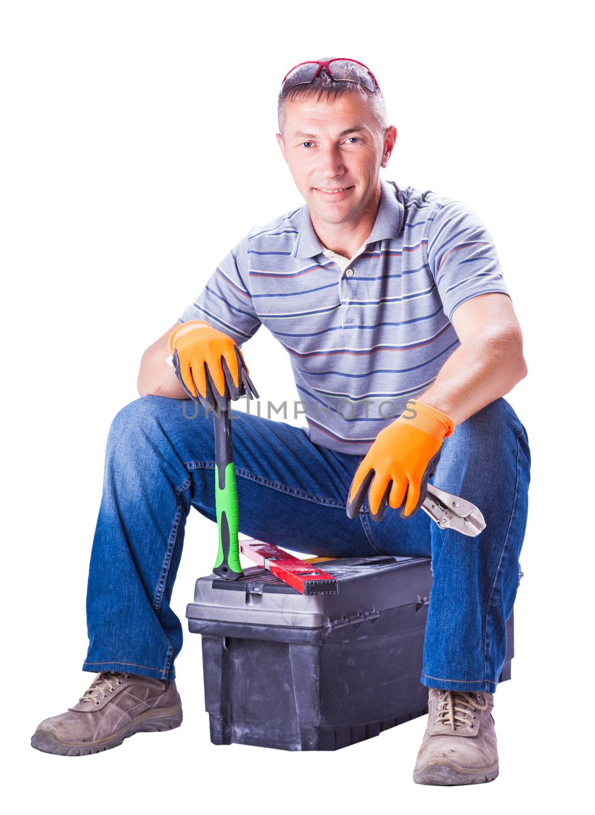 man worker sitting on the tool box