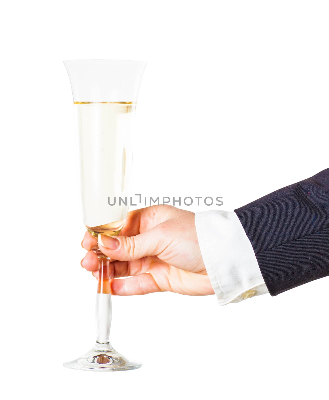 glass of sparkling champagne in a female hand isolated on a white background