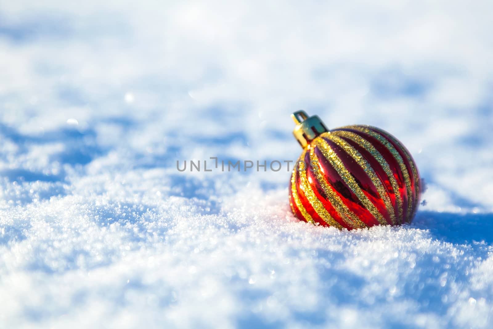 toy lying in the snow, Christmas background
