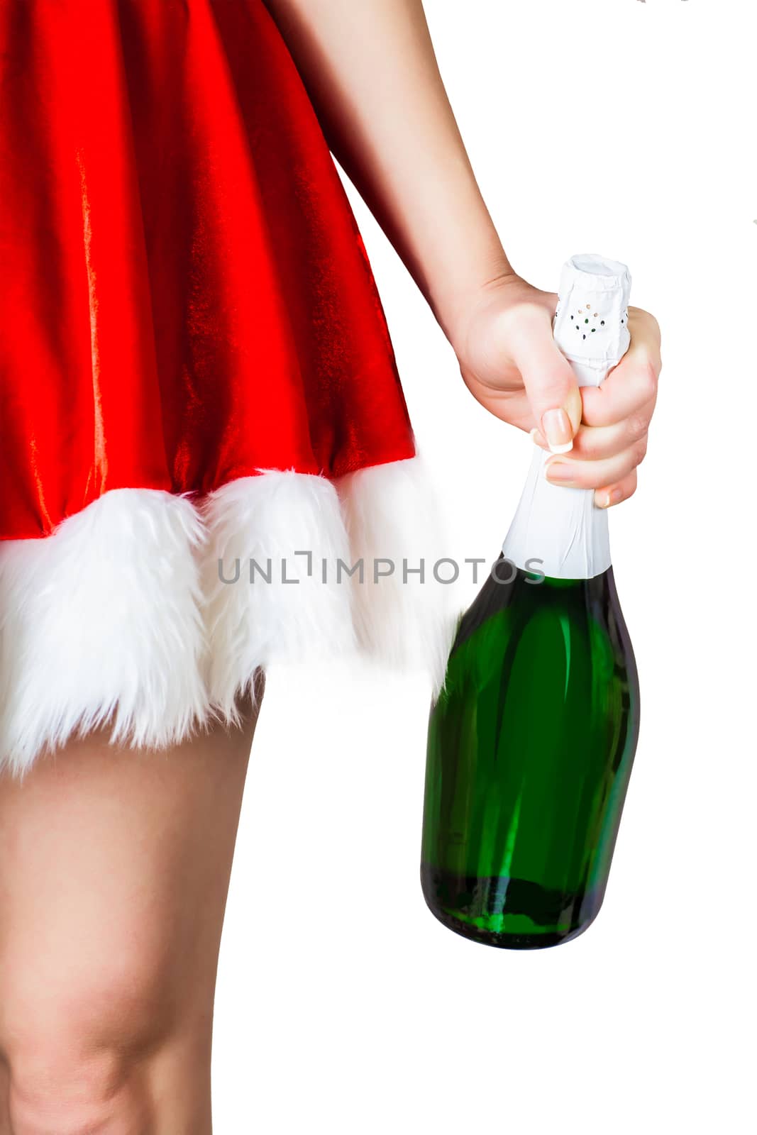 girl in a New Year's suit holding a bottle of champagne