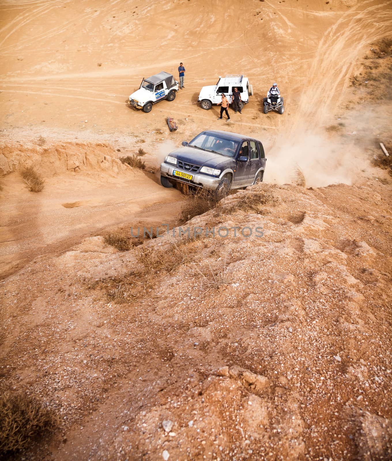 BEER-SHEVA/ISRAEL - 23 NOVEMBER 2013: Jeep is trying to call the mountain desert . 23 november Israel.