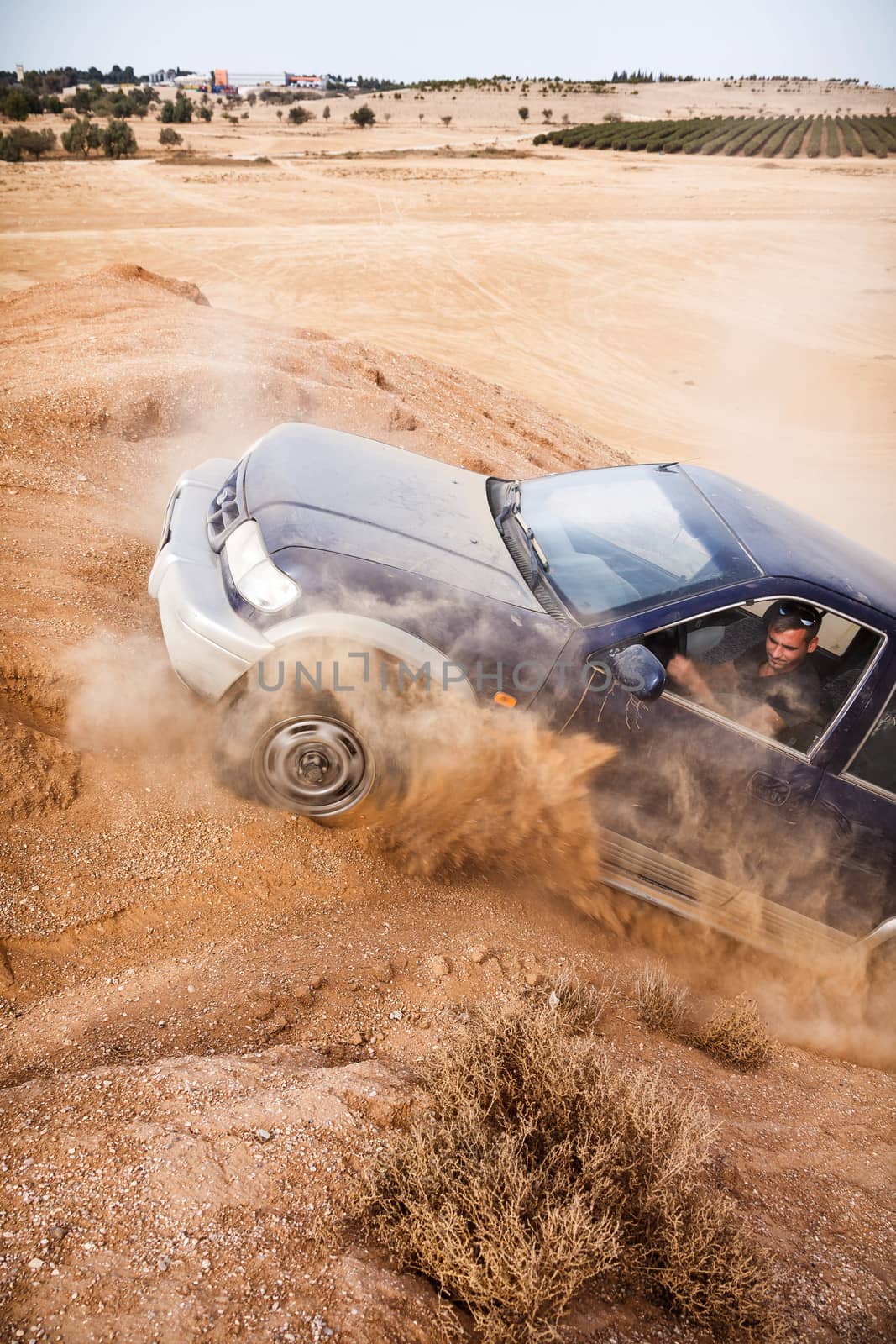 BEER-SHEVA/ISRAEL - 23 NOVEMBER 2013: Jeep is trying to call the mountain desert . 23 november Israel.