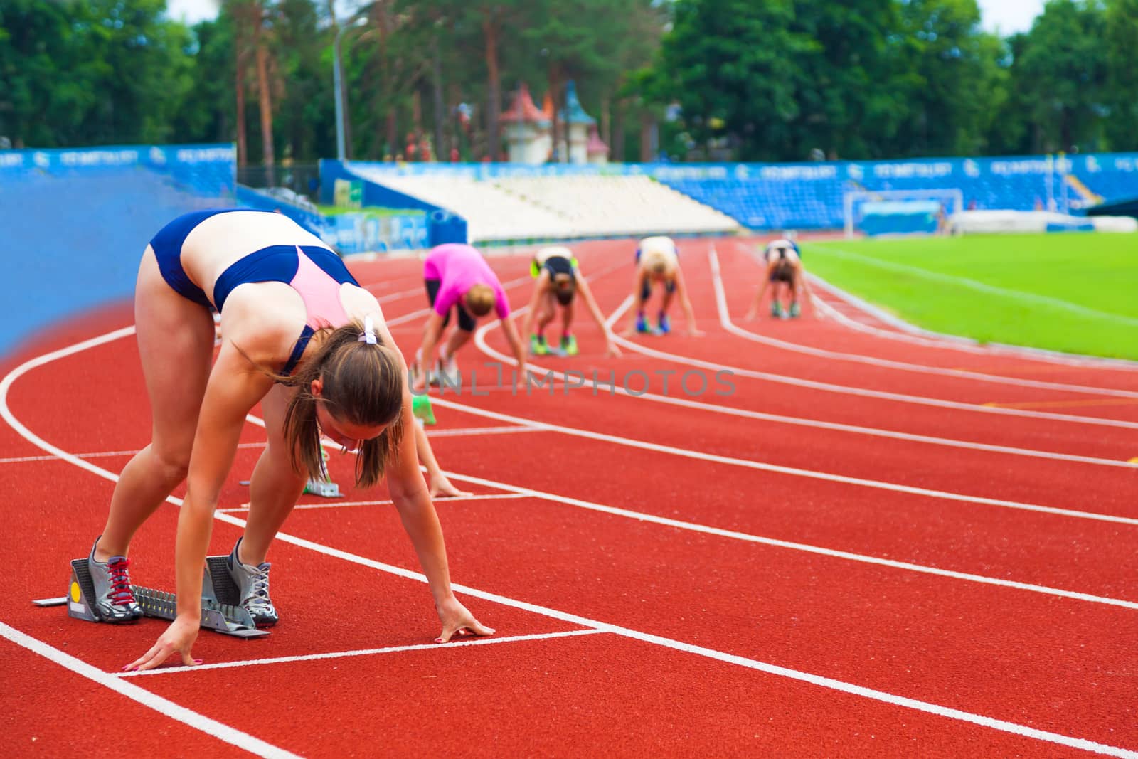 sportswomen at the start, sports background