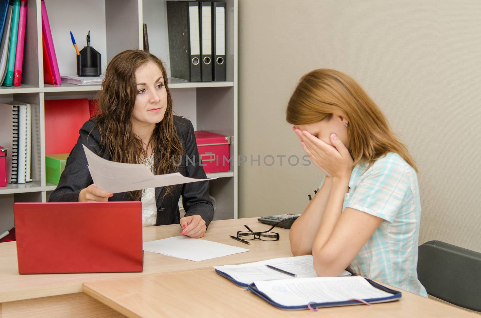 Young beautiful girl on reception at the office specialist