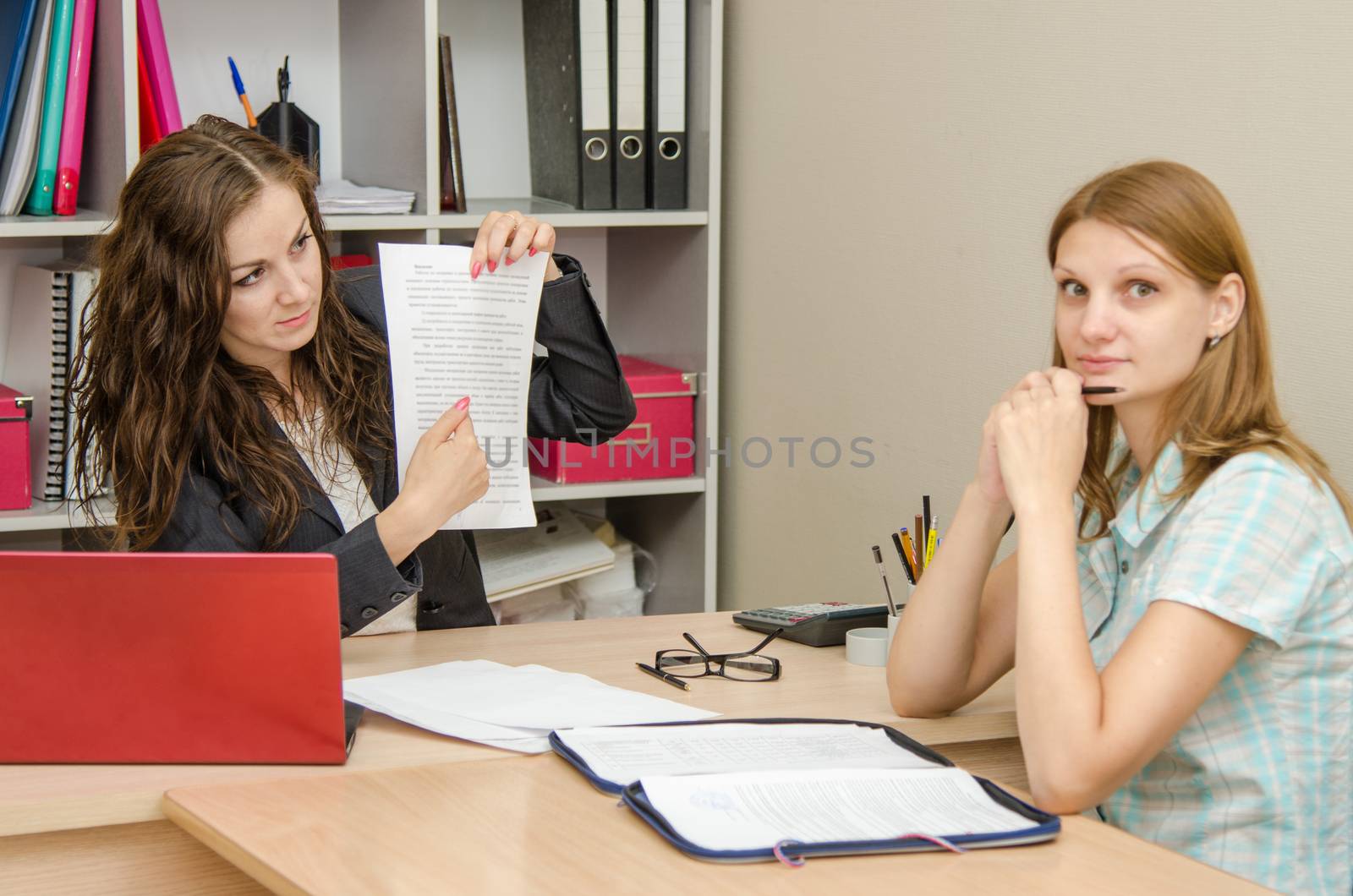 Young beautiful girl on reception at the office specialist