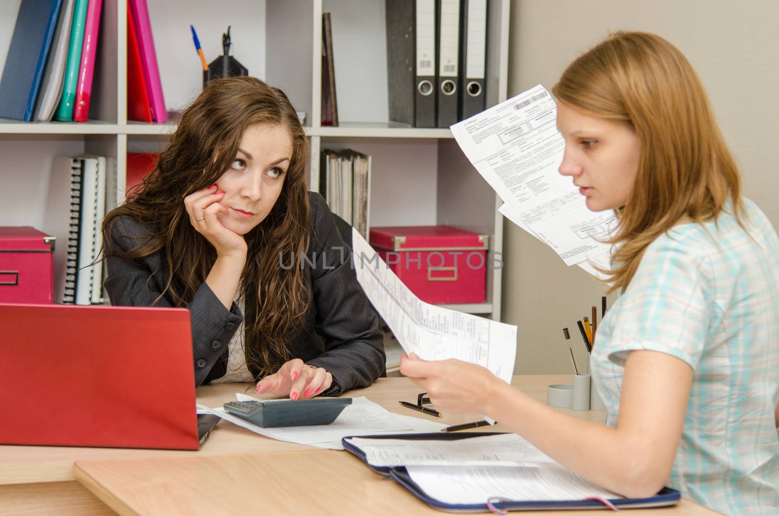 Young beautiful girl on reception at the office specialist